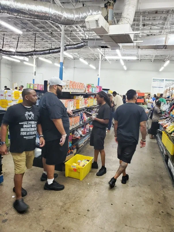GSG brothers volunteering at a food distribution site